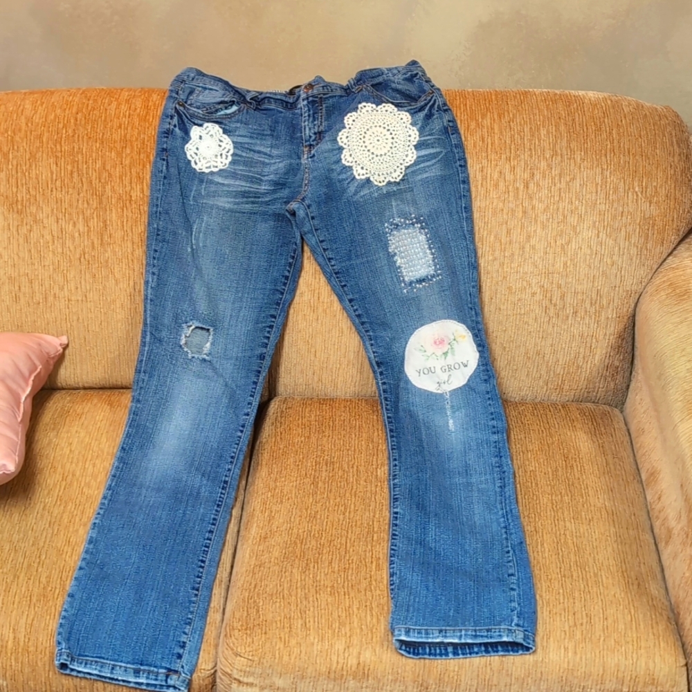 Narrow side leg low-rise embellished jeans.